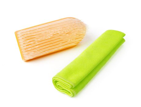 Cleaning brush and cloth isolated on white background, close up