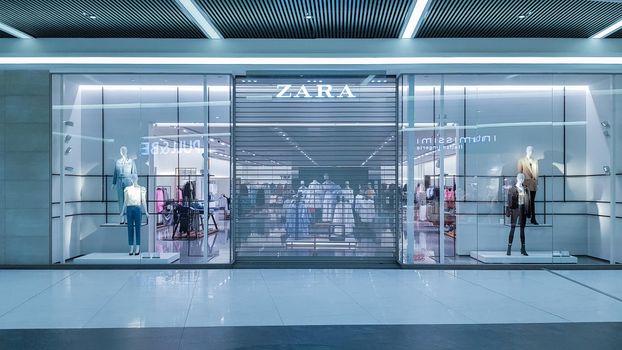 Ukraine, Kiev - May 09, 2020: Locked doors of the Zara fashion store during the Covid 19 pandemic. Mobile photography. Closing of the quarantine shopping center and retail stop