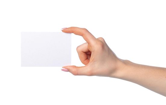 Woman's hand with blank white business card isolated on white background