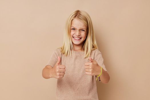 Beautiful little girl with blond hair lifestyle concept. High quality photo