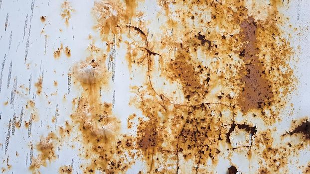 Dark shabby rusty metal texture background. Rusty metal surface with paint.