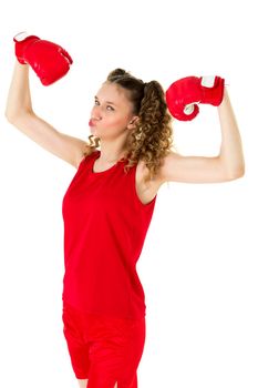 Pretty blonde teen girl boxer showing her muscles. Funny girl athlete with curly hairstyle demonstrating her power against isolated white background. Sports healthy lifestyle, girls power concept