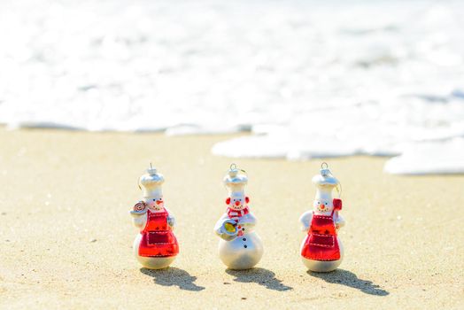 Snowman of sand. Holiday concept for New Year and Christmas. Festive header design for your website
