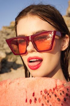 woman eating watermelon outdoors Sun summer close-up. High quality photo