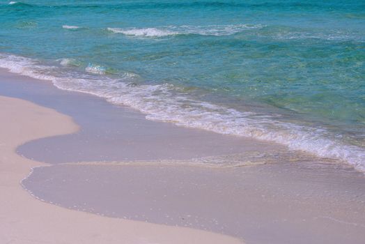 Sand beach with blue ocean and cloudscape background. Ocean blue Background