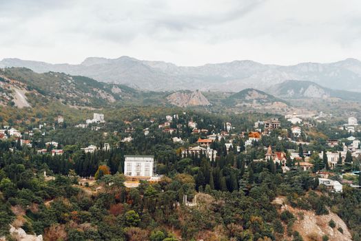 Landscape of resort town in summer mountains.
