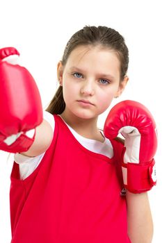 Sports boxer teenage girl. Close up portrait of beautiful girl in red sports uniform and boxing gloves doing boxing exercises. Teenager child posing in studio on white background