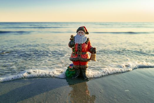 New Year travel. Toy summer Santa. Christmas banner, poster or greeting cards