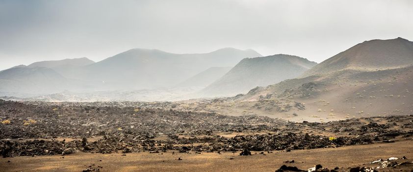 beautiful mountain landscape with volcanoes in Timanfaya National Park in Lanzarote, Canary Islands