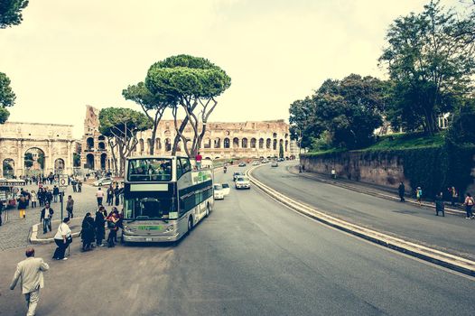 Rome, Italy - 16 November 2014: touristic bus near Coliseum