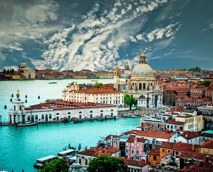 Grand Canal and Basilica Santa Maria della Salute against blue sky, Venice, Italy