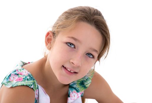 Schoolgirl teenage girl studio portrait close-up. Isolated on white background