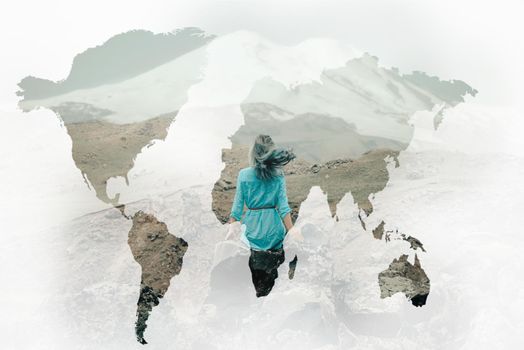 Double exposure of traveler young woman resting in the mountains with map of world, concept of wanderlust.
