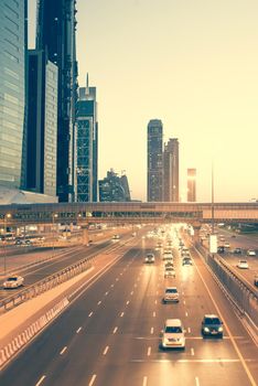 Skyscraper roads and bridge at the Sheikh Zayed Road in Dubai in the evening, United Arab Emirates