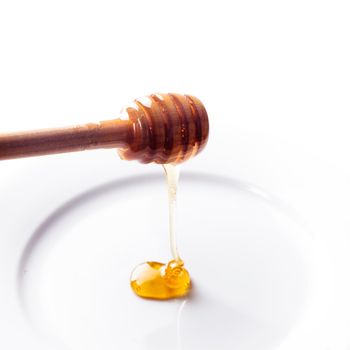 Honey drip isolated on a white background