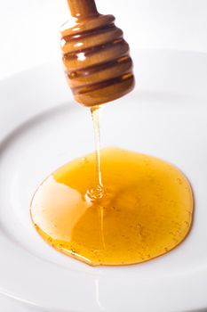 Honey drip isolated on a white background