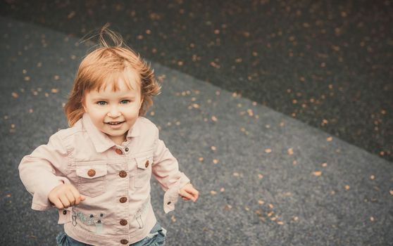 playing little girl on a playground