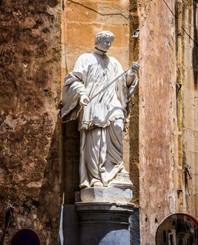 statue of S.Luigi in a street of Valletta city in Malta