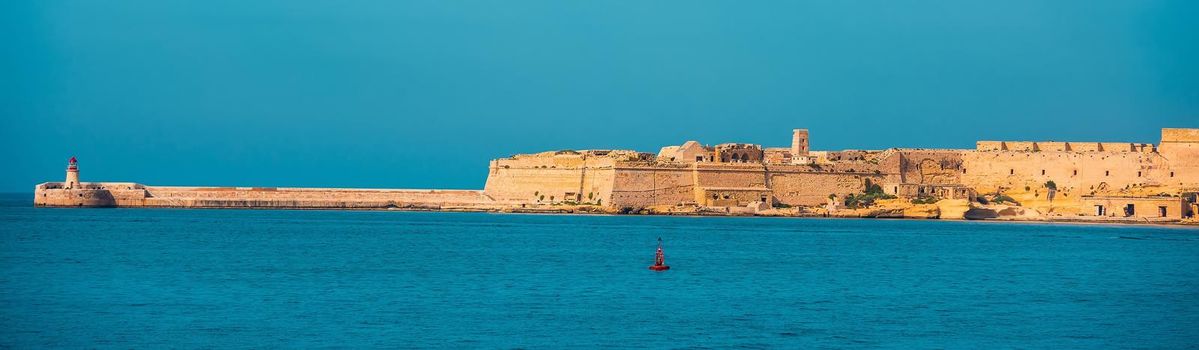 Lighthouse in Valletta from sea