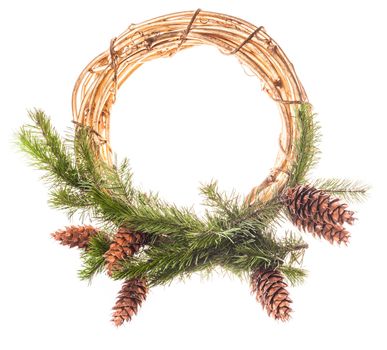 Christmas wreath from spruce branches with cones