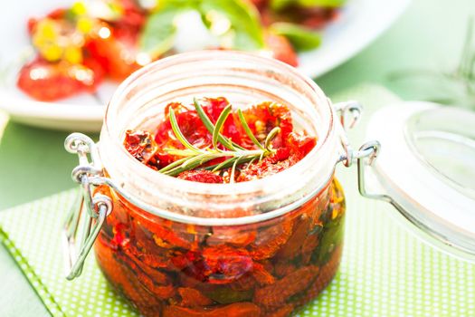 sun dried tomatoes in a glass jar