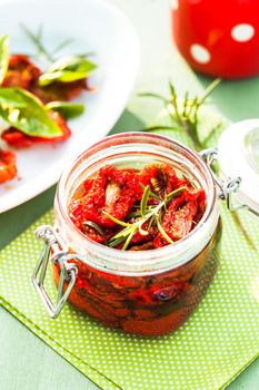 sun dried tomatoes in a glass jar