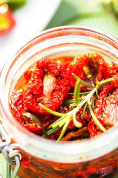 sun dried tomatoes in a glass jar