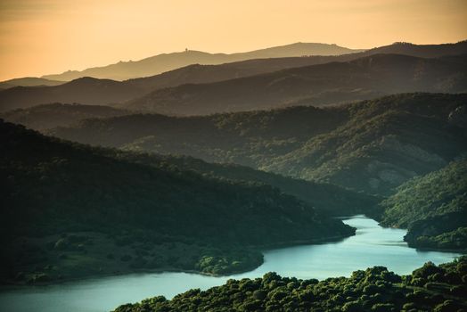 wonderful landscape of sunset in mountain valley with river