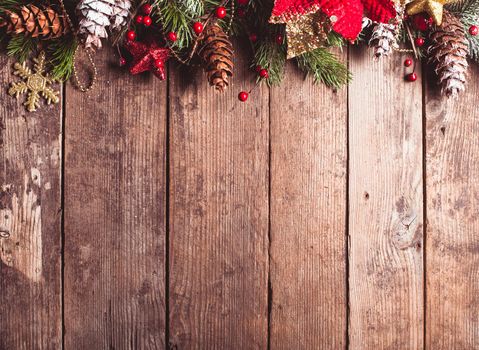 Christmas border design on the wooden background