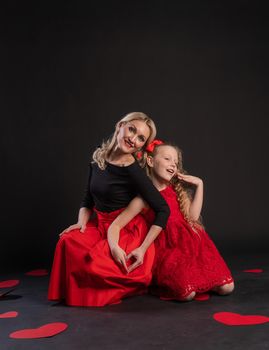 Girl and baby sign love hands keep happy, happiness valentine, on the floor hearts lovely. Inspiration. copy of the space forever, hearts in red girl dress, barefoot