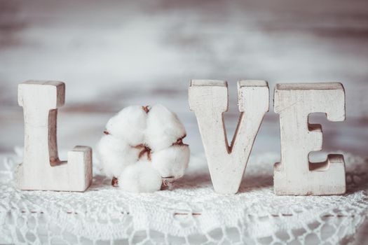 Love wooden letters on the crochet doily, vintage styled and cotton flower