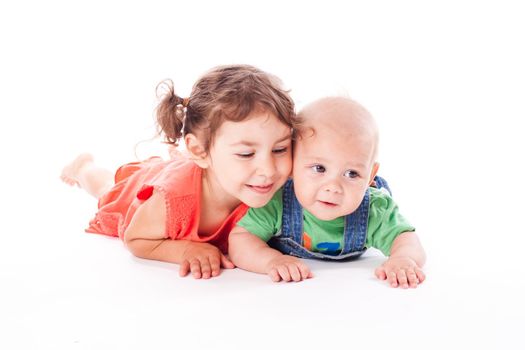 Adorable family. Sister and brother isolated on white