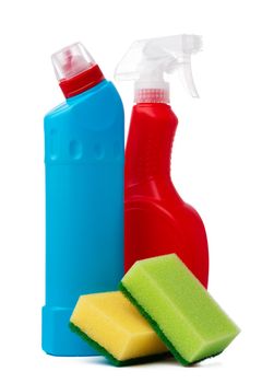 Bottles with cleaning products and sponge on a white isolated background, copy space