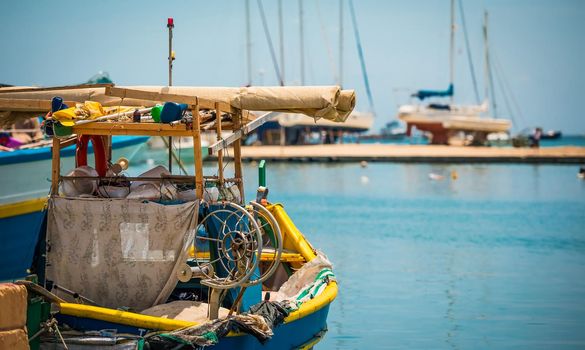 colorful fishing boat in the bay near Marsaxlokk in Malta