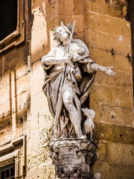 statue of S.Luigi in a street of Valletta city in Malta