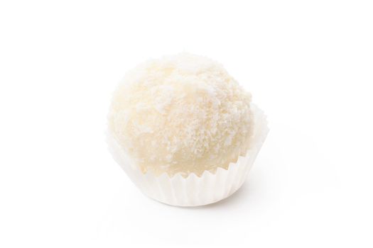 White chocolate candy with coconut topping isolated on white background