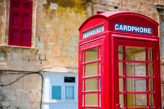 red cardphone in a steet of Valletta in Malta
