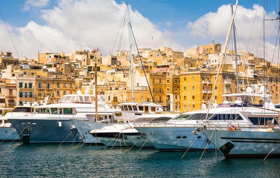 yachts in Valleta port on the background of the city in Malta