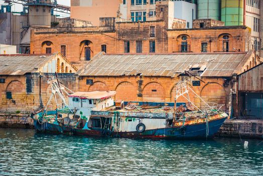 old ruined abandoned fising boat near Valletta in Malta