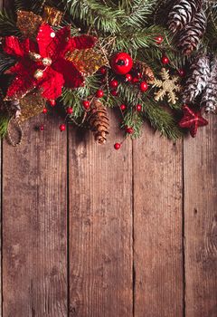 Christmas border design on the wooden background