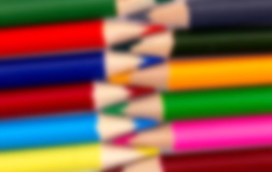 Blurred background of new wood pencils tip on stationary shelf. Pencil is a school supply that student need to have for education.