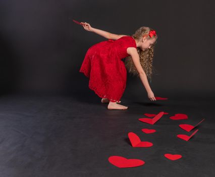 paper hearts love red, heart valentine's day, on the floor hearts romance wedding. art. emotions formula of love, joy in a red dress girl, barefoot