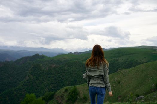 woman hiker mountains travel landscape adventure. High quality photo