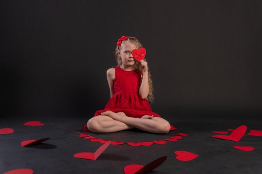 paper hearts red, design, on the floor hearts romance space. inspiration. love formula of love, frame in red dress girl, barefoot