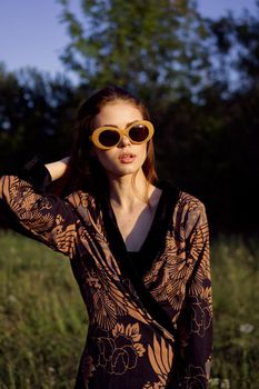 fashionable woman in sunglasses outdoors summer glamor. High quality photo