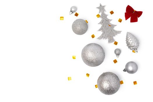 Top view of Christmas decorations composition on white background with copy space