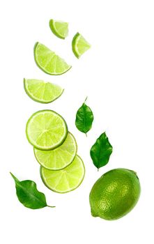 Chopped lime fruit isolated on white background. High quality photo