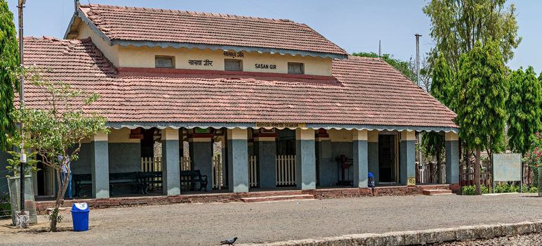 Old traditional roof tiles on Sasan Gir railway station building in Gujarat.