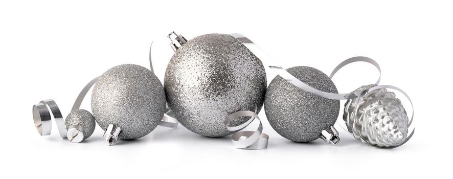 Silver sparkling Christmas baubles isolated on white background, close up