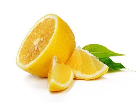 Cut lemon slice isolated on white background. High quality photo